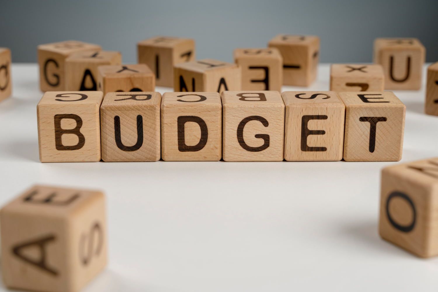 Wooden blocks with budget written on them kept on table